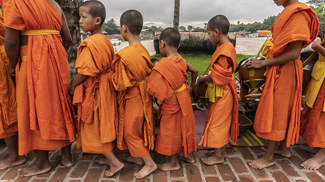 novice monks in laos